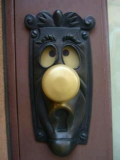 a door handle with a face on it