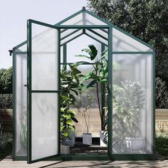 a green house with two plants in it