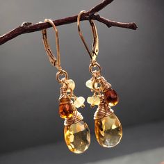 "6938 Citrine Garnet Ethiopian Opal Earrings Gold Filled wire wrapped natural gemstones bohemian statement cluster dangle drops birthday anniversary Valentine's day Mother's day Christmas holiday gift for her women mom sister wife girlfriend daughter niece aunt grandma cousin colleague best friend. Enjoy the beauty & power of natural gemstones. MATERIALS & DIMENSIONS ✦ Natural gemstones: - CITRINE, golden yellow, faceted teardrops approx. 13x10mm; - GARNET, red-orange, faceted teardrops approx. Wire Wrapped Citrine Dangle Earrings, Bohemian Briolette Wire Wrapped Earrings, Bohemian Citrine Wire Wrapped Jewelry, Bohemian Amber Wire Wrapped Earrings, Bohemian Amber Wire-wrapped Earrings, Bohemian Wire Wrapped Citrine Jewelry, Bohemian Wire-wrapped Citrine Jewelry, Wire Wrapped Citrine Dangle Jewelry, Ethiopian Opal Earrings