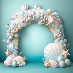 an arch made out of balloons and seashells on a blue background with stars