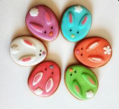 six decorated cookies in the shape of animals