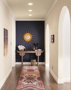 the hallway is clean and ready for guests to use it as a focal point in this photo