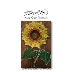 an image of a sunflower with beads on it and the words hard copy template