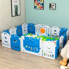 a child's playpen in the corner of a room