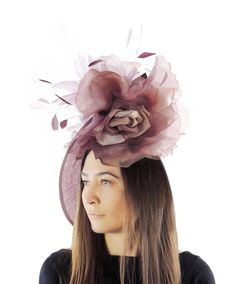 Hats By Cressida Kentucky Derby & Ascot Fascinator Hats Burgundy Lilac Ariel Sinamay Feather & Silk Fascinator Gorgeous trimmed feathers surround large silk rose  with a large saucer sinamay base Base measures about 12 inches wide Mounted with a matching headband. If you prefer a headband to match your hair, please make a note at check out what colour headband you want. Get ready to steal the show with the stunning Ariel Fascinator Hat! Perfect for any special occasion, this headpiece is the epi Kentucky Oaks, Kentucky Derby Fascinator, Royal Ascot Hats, Feather Headpiece, Ascot Hats, Hat Fascinator, Flower Fascinator, Feather Wedding, Melbourne Cup