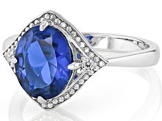 2.40ct Oval Lab Created Blue Spinel With 0.06ctw Round White Zircon Rhodium Over Sterling Silver Ring. Measures Approximately 0.80"L x 0.96"W. Not sizeable. Accent stones primarily zircon. Oval Lab-created Sapphire Ring With Diamond Cut, Blue Spinel, Sterling Silver Ring, Silver Ring, Sterling Silver Rings, Lab, Silver Rings, Sterling Silver, Ring