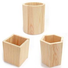 three wooden containers sitting next to each other