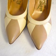 "Vintage 1950s cream and beige colorblocked leather stilettos.  Made by Renazzo.  Marked a size 7 1/2 AAAA, but would fit up to an 8 super narrow based on measurements (allow room for the pointy toe).  They measure 10\" long inside from toe to heel and 2 5/8\" wide.  The heel is 3 1/2\" tall.  In fair condition, with some wear to the soles, some faint scuffs, and missing heel caps. ---> If you need an order shipped by a particular date or shipped via a quicker method, please ask PRIOR to purchas Leather Stilettos, Sewing Tape Measure, Neutral Heels, Womens Pumps, Heel Caps, Vintage 1950s, Size 7, Heels, Leather