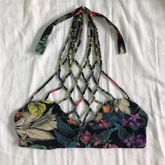 Nwot San Lorenzo Reversible Bikini Top. Beautiful Halter Top. Multicolored Floral Pattern On One Side And Black On The Other. Moonlit Garden Noir Style. In Perfect Condition, New Without Tags. Size Small. Please Leave Any Questions Or Comments Below! Offers Are Welcomed! I Can Ship Asap :) Spring Black Strappy Swimwear, Black Strappy Swimwear For Spring, Fitted Strappy Swimwear For Festival, Black Halter Top With Tie Back For Pool, Black Tie-back Halter Top For Pool, Black Strappy Swimwear With Tie Back, Black Halter Top With Tie Back For Beach Season, Black Tie-back Halter Top For Beach Season, Black Tie Back Halter Top For Beach Season