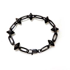 Handcrafted mens bracelet with a heavy pewter antiqued black spikes chain. Super cool and fashion forward, wear it with Jeans and a T-shirt or dressed up. Bracelet measures 7.5" Available in any custom size Made with love in Los Angeles Complimentary gift wrapping provided All sales final. Punk Black Bracelets With Spikes, Black Punk Chain Bracelet As A Gift, Black Punk Style Chain Bracelet As Gift, Black Punk Style Chain Bracelet For Gift, Punk Style Black Chain Bracelet Gift, Black Spiked Edgy Bracelets, Edgy Black Spiked Bracelets, Black Punk Jewelry With Spikes, Black Metal Chain Bracelet With Oxidized Finish