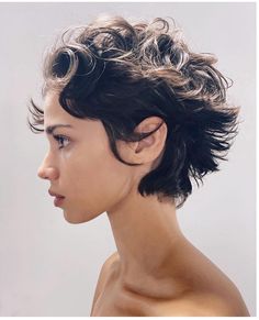 The 15 Coolest Short Fluffy Hair Styles To Rock In 2024 Interesting Haircuts Women, People Face Reference, People With Interesting Faces, Short Fluffy Hair Female, Face Photography Reference, Short Hairstyles Masc, Short Curly Fluffy Hair, Hair Styles Curly Short, Interesting People To Draw