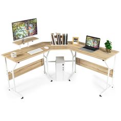 a computer desk with two computers on it