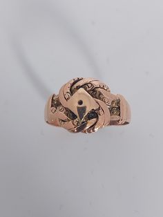 An unusual 1940s rose gold ring. It is 9ct gold & hallmarked 1941. There is a small joining repair on band in yellow gold (see photo) which masks some of the hallmark. The design is of an intricate knot. Very decorative. Understood to have had one owner since new. Suitable for male or female. Size L in the UK, 50 & 7/8 European standard . Inside diameter 16.30mm & inside circumference 51.20mm Perfect for anyone who loves vintage jewellery. Perfect gift. Collectible 14k Rose Gold Rings, Vintage 14k Rose Gold Rings, Antique 14k Rose Gold Rings, Vintage 14k Rose Gold Rings In Gold Color, Vintage 14k Rose Gold Jewelry, Vintage 14k Rose Gold Jewelry For Formal Occasions, Vintage 14k Rose Gold Jewelry For Anniversary, Vintage Rose Gold 14k Gold Signet Ring, Vintage 14k Rose Gold Rings For Formal Occasions