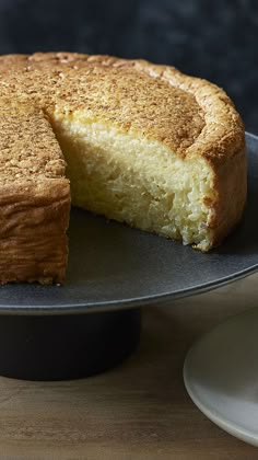 a cake on a plate with one slice missing