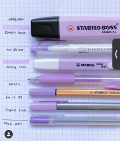 several pens are lined up on top of a piece of paper with the words stabilo boss written in it