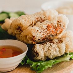 These Crispy Net Spring Rolls feature a mixture of ground pork, veggies and rice vermicelli wrapped in lacy, rice flour wrapper. Coconut Milk Tea, Tapioca Dessert, Veggies And Rice, Rice Wrappers, Coffee Popsicles, Rice Paper Wrappers, Vietnamese Pork, Fried Spring Rolls, Vietnamese Spring Rolls