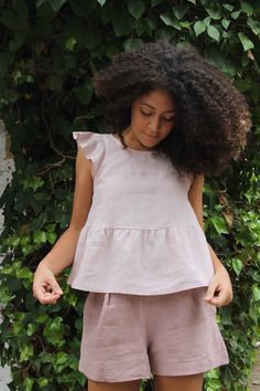 "SIZES It is a top designed for the hottest days of summer. You can combine it with any skirt or pants in my store. It is made with high quality washed linen. At the back it has a small opening at the neckline with a coconut button. Details Oeko-Tex certified quality guarantee. 100% European linen (Lithuanian linen )of the best quality of a medium weight (185gr) This linen is washed and softened to have a nice touch. Linen is an ecological and breathable fabric as it is a 100% natural fabric. Al Summer Ruffled Relaxed Fit Top, Summer Ruffle Top With Relaxed Fit, Relaxed Fit Ruffled Top For Summer, Relaxed Fit Ruffle Top For Summer, Feminine Linen Blouse For Summer, Feminine Pink Linen Top, Pink Linen Blouse For Summer, Fitted Pink Linen Top, Pink Linen Tops For Spring