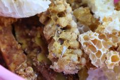 a close up view of some food in a pink bowl