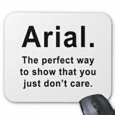 a white mouse pad with the words arial on it next to a computer mouse