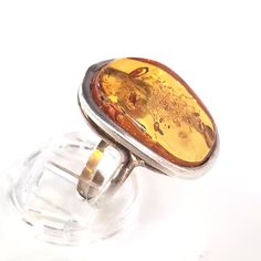 large amber silver ring Modern Amber Oval Ring, Handmade Modern Amber Rings, Modern Handmade Amber Rings, Oval Baltic Amber Rings In Amber Color, Oval Baltic Amber Ring In Amber, Oval Baltic Amber Ring, It Original, Amber Ring, Amber Stone