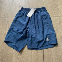 These Nice Shorts From Adidas Feature Side Pockets, An Elastic Drawstring Waistband, And 7” Inseam. New With Tags Size Small Msrp $30 Adidas Summer Activewear With Built-in Shorts, Adidas Activewear With Built-in Shorts For Summer, Spring Adidas Moisture-wicking Bottoms, Adidas Casual Activewear With Elastic Waistband, Casual Adidas Activewear With Elastic Waistband, Sports Bermuda Bottoms With Elastic Waistband, Adidas Blue Cotton Shorts, Blue Summer Activewear With Pockets, Casual Adidas Blue Athletic Shorts