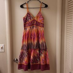 Nwt, Adorable Size Medium, Multi-Color Print With Adjustable Spaghetti Straps. Fully Lined With Hidden Side Zipper. Length Approx 41.5" From Shoulder To Hemline, Pit To Pit 15" Flat, Waist 13.5" Flat. I Believe The Care Tag Is Missing Because I Cannot Find It Photo #10 Shows 3 Small Holes On The Lower Back And Photo #11 Shows A Small Hole On The Inside Lining Of The Dress. Romeo + Juliet, Established In 1999, Is Best Recognized For Its Contemporary Clothing Design That Exudes A Chic, Easy Elegan Purple Lined Midi Length Dresses, Purple A-line Beach Dress, Purple Sleeveless Sundress, Purple Sundress Midi Dress For Summer, Purple Summer Sundress Midi Dress, Purple Midi Sundress, Fitted Purple Summer Midi Dress, Purple V-neck Sundress For The Beach, Purple Knee-length Sundress