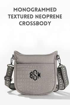 Our Personalized Textured Neoprene Crossbody is going to be your new favorite bag to carry. This trendy bag is designed to elevate your style while providing the convenience you need while on your daily adventures. It features a debossed design on the outside and an accent adjustable strap for fashion-forward style. With its neutral color, this crossbody will pair nicely with several different outfits. Embossed Shoulder Bag For Travel, Everyday Embossed Crossbody Bag, Embossed Crossbody Bag For Everyday Use, Everyday Embossed Crossbody Shoulder Bag, Embossed Crossbody Shoulder Bag For Everyday Use, Embossed Crossbody Travel Bag, Embossed Satchel Bag For Travel, Embossed Travel Shoulder Bag, Embossed Rectangular Shoulder Bag For Travel