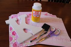 craft supplies laid out on top of a table