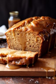 a loaf of bread with caramel drizzled on it and sliced into slices