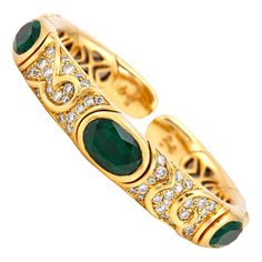 This beautiful Marina B cuff bracelet is finely crafted in 18K yellow gold with green tourmaline and diamonds. The diamonds weigh an approximate of 5.00 CT. Jewelry Bulgari, Dope Jewelry Accessories, Bvlgari Jewelry, Gold Cuff Bracelet, Tourmaline Bracelet, Dope Jewelry, Gold Bracelet Cuff, Gold Cuffs, Colorful Jewelry