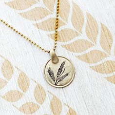 NEW COINS COLLECTION! + FREE SHIPPING ! Wheat pendant-A symbol for prosperity, abundance and hope ,  abundance necklace,prosperity brass pendant, gift for her, gift for him,  D E S I G N  The signification of wheat is  abundance ,and hope and charity. Wheat is a necessity for life and it is also the breakthrough point for mankind to existential development - to a prosperous civilization In art- A man or woman harvesting wheat  is a sign of fertility and productivity, and grains represent the lif Gold Jewelry For Blessing Events, Everyday Etched Pendant Necklace, Everyday Symbolic Brass Necklace, Brass Charm Necklace With Large Round Pendant, Gold Nature-inspired Necklace With Large Pendant, Spiritual Brass Charm Necklace With Coin Pendant, Good Luck Yellow Gold Brass Necklaces, Good Luck Yellow Gold Brass Necklace, Symbolic Brass Round Pendant Necklace