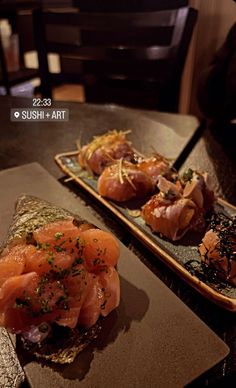 two plates filled with food on top of a table