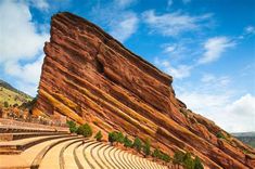 a large rock formation with steps leading up to it