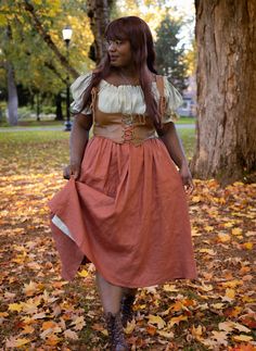 THIS ITEM IS FINAL SALE Our new linen skirts are the perfect garment for renaissance faire costumes and cottagecore wardrobes alike! We wanted to create a piece that was as multi-functional and versatile as it was well made and timeless. Our linen skirts are the perfect wardrobe staple, perfect for pairing with our corsets and chemises for the renaissance festival, or wearing with a blouse for a casual look. This oh-so-soft linen will have you twirling back to ye olde times.This skirt is made fr French Meadows, Linen Skirts, Sarah Sanderson, Linen Midi Skirt, Perfect Wardrobe, Historical Costume, Linen Skirt, Persimmon, Black Linen