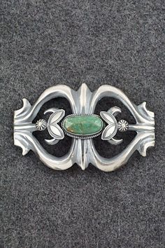 This impressive turquoise and sterling silver belt buckle was made by Navajo silversmith Henry Morgan. The back of the buckle is signed M and stamped sterling.Length: 2"Width: 3 1/4"Free shipping on all orders! We ship with USPS and always include tracking. All orders ship within a day of payment.Returns are accepted up to 30 days after you receive your order. Just send us a message. Our shop offers cash back or store credit. The item must be returned in new condition. Henry Morgan, Silver Belt Buckle, Bear Carving, Silver Belt, Silver Belts, Pearl Chain, Native American Jewelry, Turquoise Sterling Silver, Belt Buckle