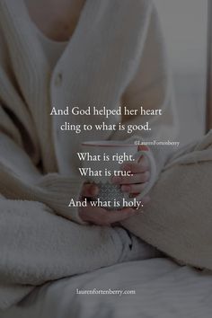 a woman holding a cup in her hands with the words and god helped her heart cling to what is good