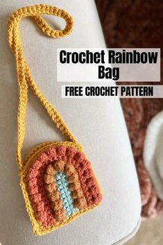 a crochet rainbow bag on a white pillow