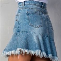 Romeo & Juliet Couture Denim Slanted Fringe Skirt - Denim With Fringes At The Bottom - Size Small- Skirt Has A Slant Design Meaning It Slants To One Side At The Bottom As Seen In The First Picture - Cute Spring And Summer Skirt That Would Go Well With A Blouse And Heels Or Sandals! (159) Summer Medium Wash Denim Mini Skirt, Spring Medium Wash Mini Skirt With Frayed Hem, High Waist Denim Skirt With Frayed Hem For Summer, Fitted Denim Skirt With Frayed Hem For Summer, Summer Mid-rise Skirt With Frayed Hem, Denim Blue Cutoff Mini Skirt For Spring, Summer Dark Wash Skirt With Frayed Hem, High Waist Denim Mini Skirt With Frayed Hem, High-waisted Denim Skirt With Frayed Hem