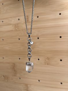 "Please keep in mind all crystal pendants are diff sizes. Each piece is unique in size and shape and will not look identical to the one in the photo.  Necklace is 15\" long & comes w a 3.5\" extender. The necklace is stainless steel.  Avoid getting the pendant wet as it is electroplated. The rest of the materials are stainless and it's okay to wear daily." Metal Crystal Dangle Necklace With Adjustable Chain, Metal Crystal Pendant Necklace With Adjustable Chain, Crystal Pendant Necklace With Chain, Silver Crystal Pendant Necklace, Spiritual Silver Dangle Crystal Necklaces, Silver Crystal Dangle Necklaces With Adjustable Chain, Silver Dangle Crystal Necklace With Adjustable Chain, Silver Crystal Pendant Necklace With Silver Chain, Silver Dangle Mineral Crystal Jewelry