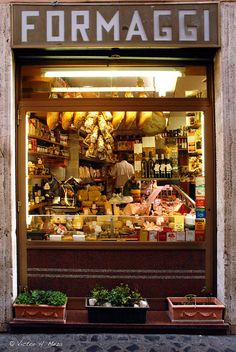 a store front filled with lots of food