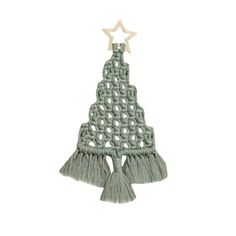 a crocheted christmas tree decoration hanging from a star on a white background, with tassels