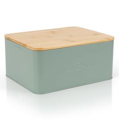 a green box with a wooden lid and the word bread on it