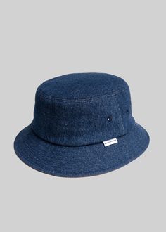 With our original bucket hat shape in a new textile, the Denim Cord Bucket Hat is an understated staple. The outer shell, deep blue, 100% cotton denim... under the brim, soft brown corduroy. It's a retro classic that's sure to stand out.  Size Circumference Brim Crown Height Width One Size 24'' 2'' 3'' 10'' Crown Heights, Watch Cap, Brown Corduroy, Soft Brown, Ball Cap, Fair Isle, Deep Blue, Bucket Hat, Shells