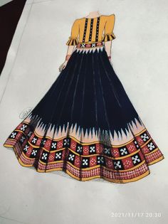 a drawing of a woman's dress in blue, yellow and red colors on paper