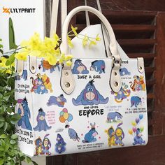 The Eeyore Winnie the Pooh Lover Leather Hand Bag is the perfect gift for Women's Day. Made with high-quality leather, this handbag exudes elegance an... Womens Handbag, Pooh Bear, Holiday Christmas Gifts, Woman’s Day, Women Leather, Everyday Items, Bag Handle, Printed Leather, Metal Buckles