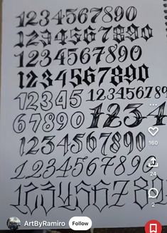 an image of some type of writing with numbers and symbols on it's side