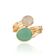 Stunning and elegant ring with big and chunky semi-precious stones, set with golden wires  18K gold plated brass   Gemstones: aqua hydro, rainbow    Nickel, lead and cadmium free Please note that each item is produced by hand and made of natural stones and pearls, and thus not identical