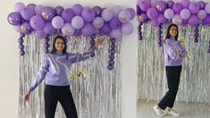 a woman standing in front of purple balloons