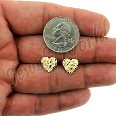 "Product Description: Brand New 10K Solid Yellow Gold Diamond Cut Heart Nugget Stud Earrings - 2 Sizes Approximate Weight - Height - Width Small - Weight: 1.7 Grams - Length: 0.45\"(11mm) Width: 0.45(11mm) Medium - Weight: 2.1 Grams - Length: 0.60\"(15mm) Width: 0.60(15mm) Metal: Real, Genuine 10K Yellow Gold ( Not Plated) Metal Purity: Stamped 10K Design: Diamond-Cut Heart Nugget Stud Earrings Material: 10K Genuine Gold Metal Stamp: 10K Country of Manufacture: Italy It comes in a Beautiful Free 14k Gold Diamond Cut Heart Earrings, 14k Gold Heart Earrings With Diamond Cut, Gold Heart Earrings Diamond Cut Gift, 14k Gold Diamond Cut Heart Earrings For Anniversary, Mens Earrings Studs, Gold Nugget, Small Heart, Stud Earring, Solid Yellow