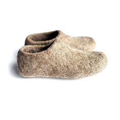 These Beige Natural Wool House Shoes make the perfect Mother's Day gift for the minimalist mom who values warmth and sustainability. Handcrafted from 100% natural wool, these barefoot grounding slippers are designed to keep feet warm and cozy throughout the winter months. With 7 custom colorways available, you can choose the perfect match for your personal style or gift someone special a pair of these eco-friendly shoes. The lightweight and breathable wool design ensures comfort while promoting Wool Gifts, Felted Slippers, Wool Slippers, Beautiful Greeting Cards, House Shoes, Felted Wool, Natural Wool, Wool Felt, Warm And Cozy